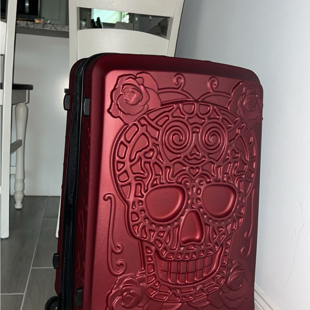 Red Skull Embossed Suitcase 20”